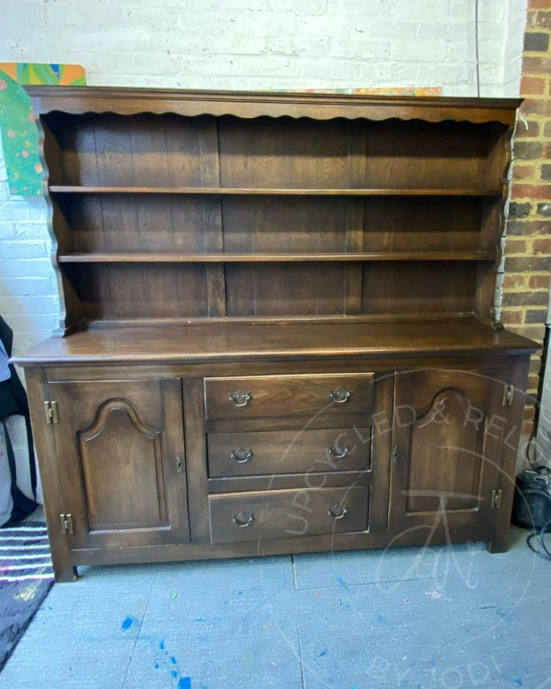Chunky brown dresser with shelves, cupboards and drawers before its painted furniture makeover by Upcycled & Reloved by Jodi.